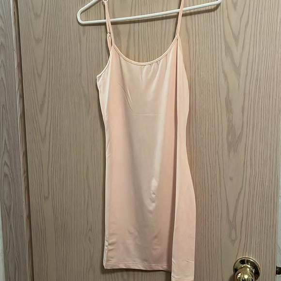 Love McNicoll pretty pastel coloured dress with a peach long camisole underneath - Picture 3 of 7